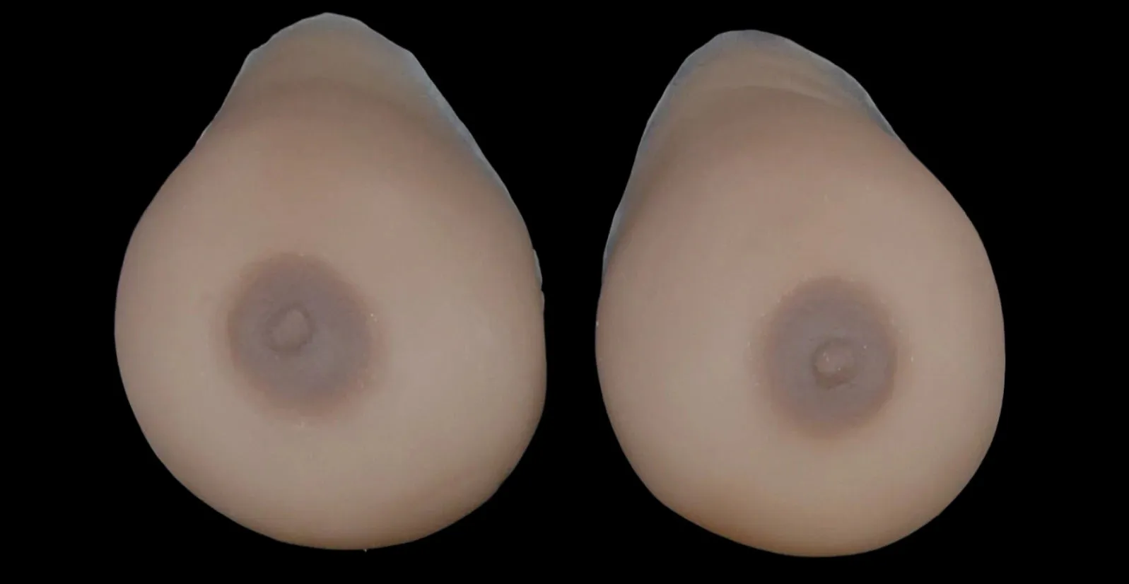 GenderMender Super-Squish. Silicone. Self-Adhesive Breast Forms in Over 100 Skin-Tones!
